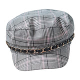 River Island women's plaid newsboy cap black pink white front view