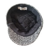 Mango houndstooth newsboy cap black white interior view