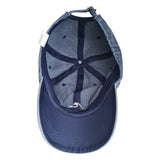 Navy blue baseball cap with a brand logo on a white background